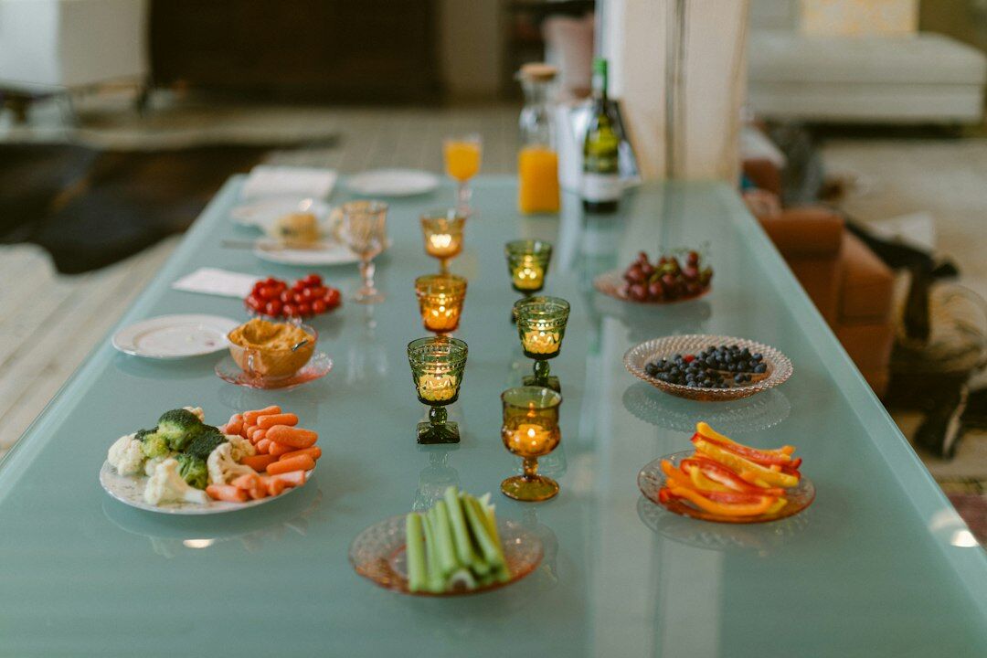 Colorful fresh vegetables and fruits arranged on a wooden table