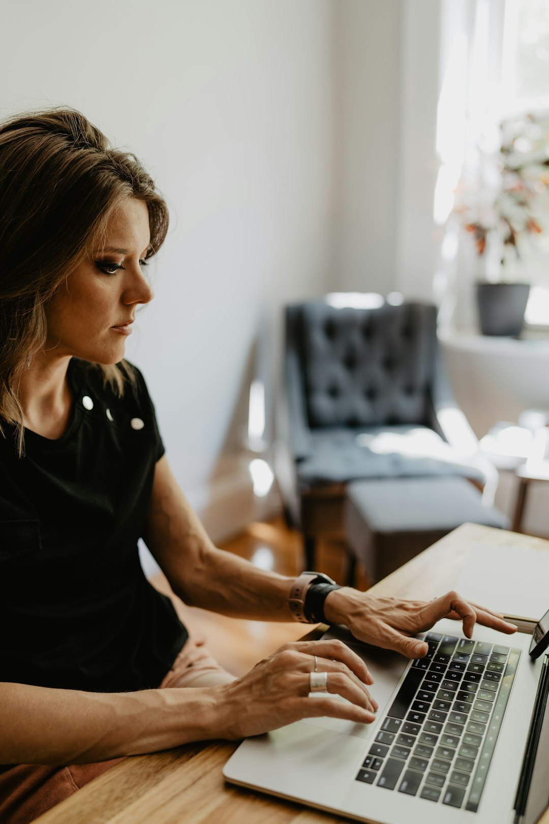 woman reviewing health data on laptop